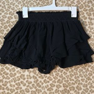 Black vestique mini skirt